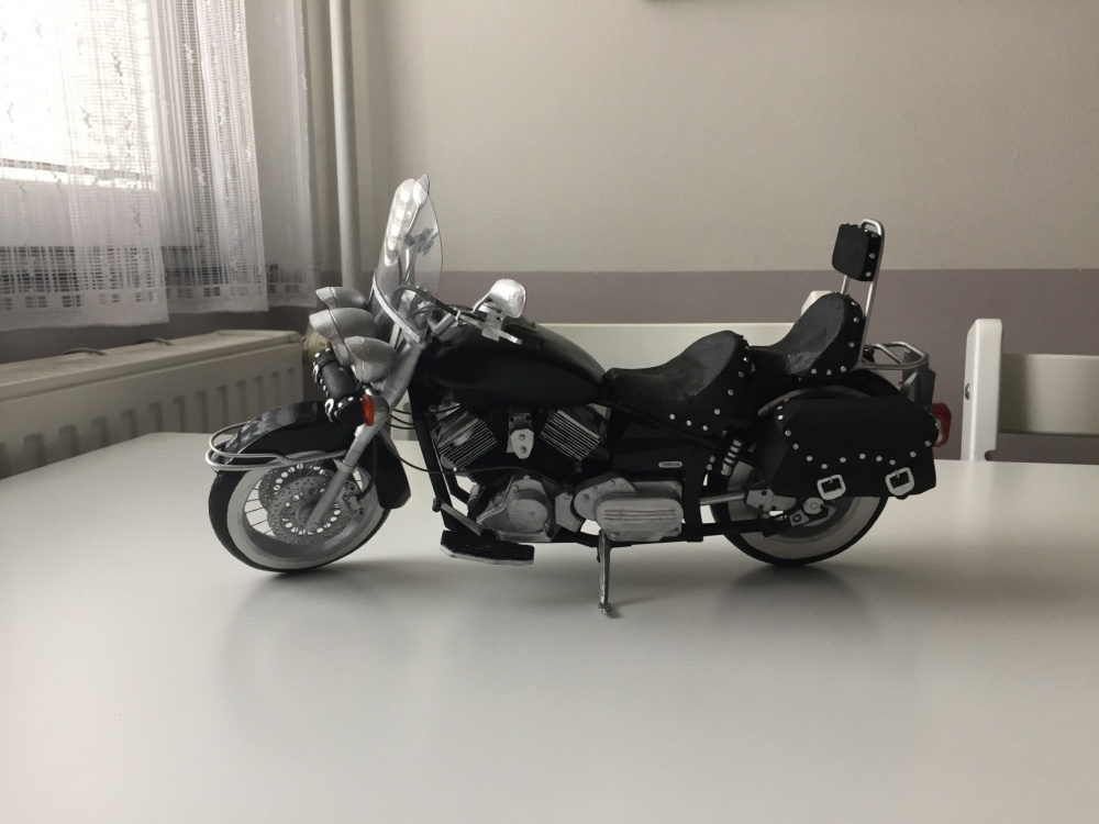 313098