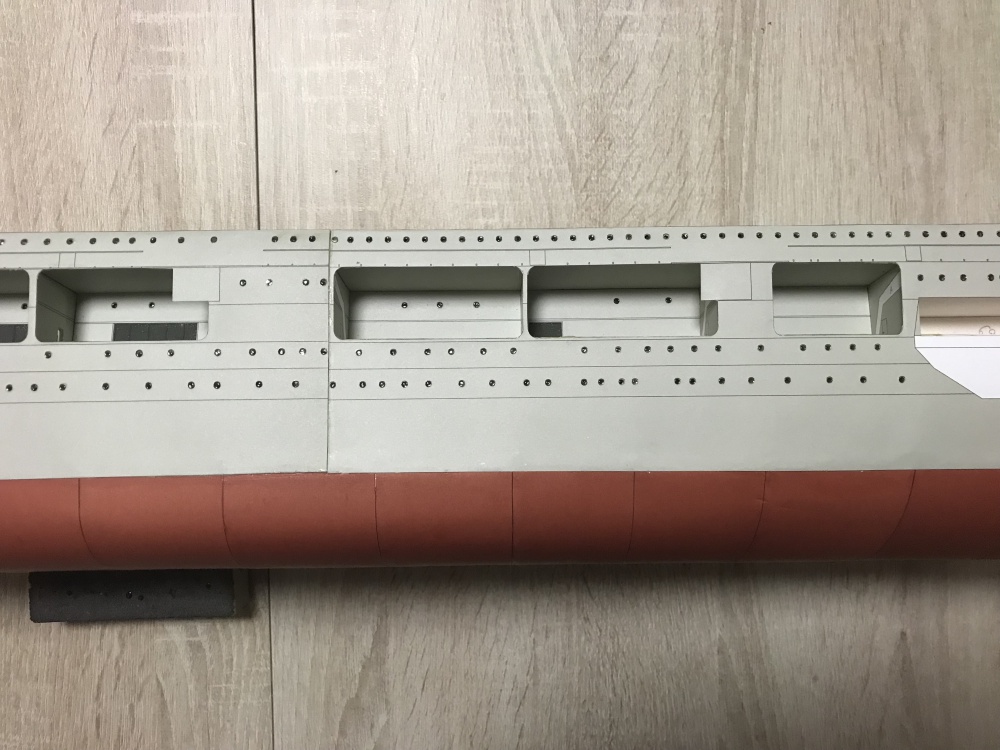 353030