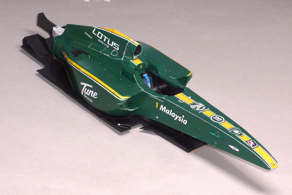 Lotus T127 - Jarno Trulli - GP Bahrainu 2010 (Plná velikost v novém okně) Lotus T127 - Jarno Trulli - GP Bahrainu 2010