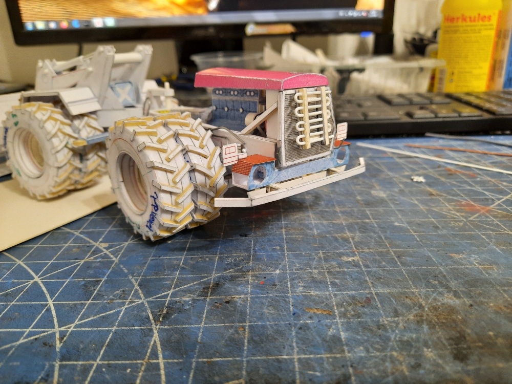 381025