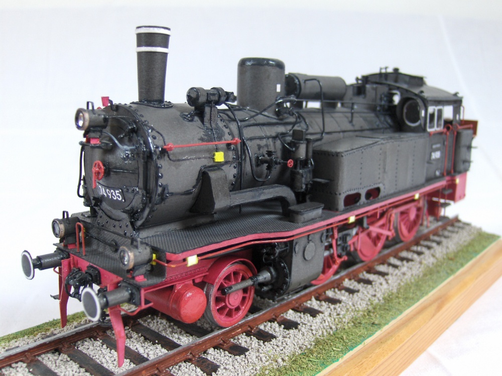 394936