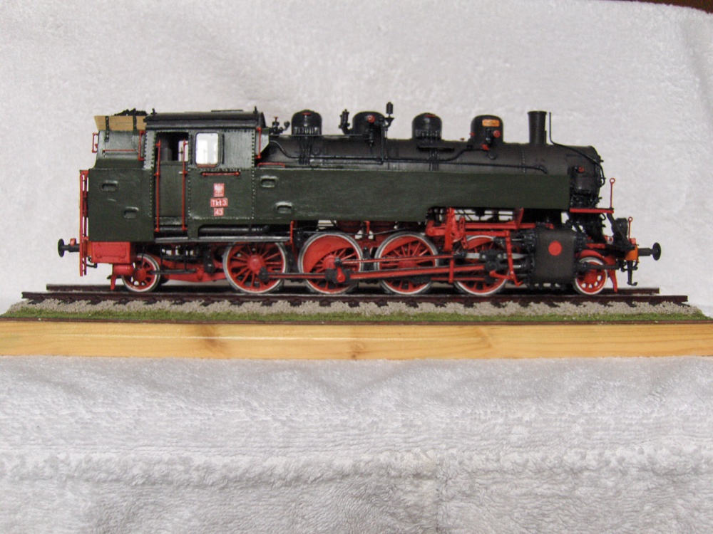 394990