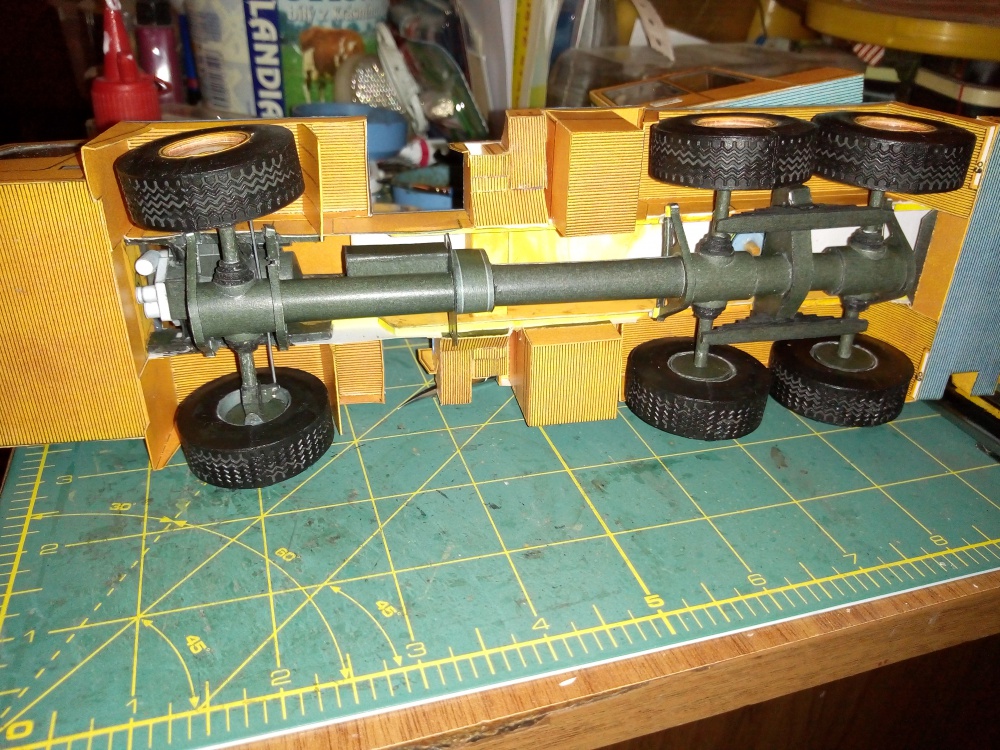 398025