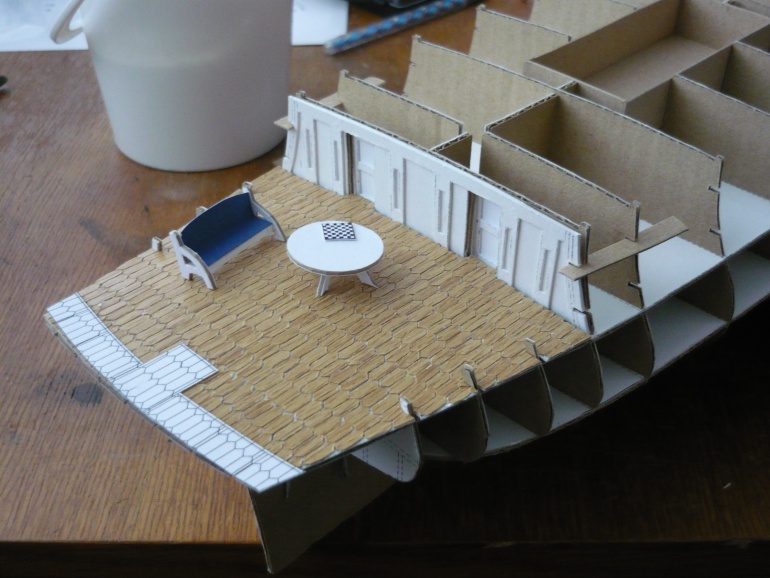 38437