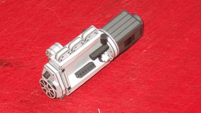 9077