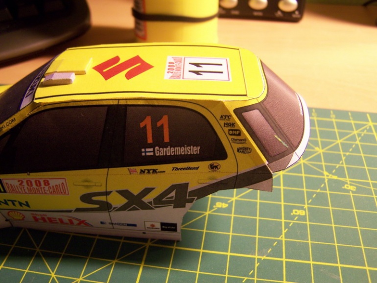 Suzuki SX4 WRC (Plná velikost v novém okně) Suzuki SX4 WRC