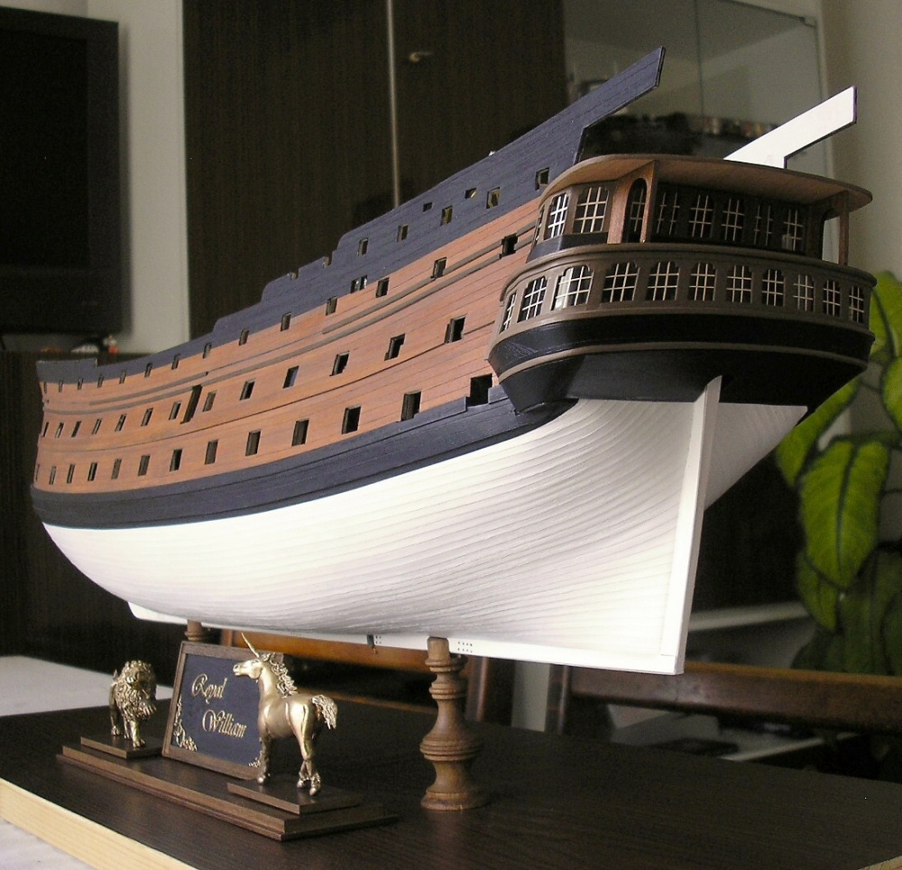 169046