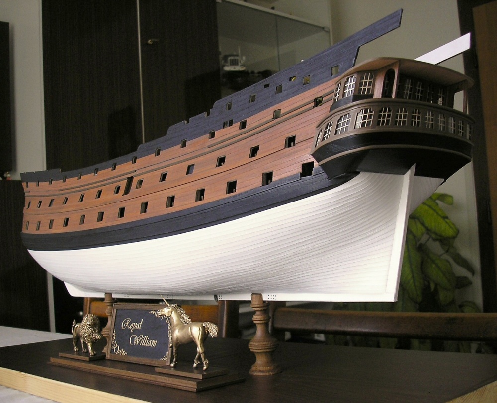 169047